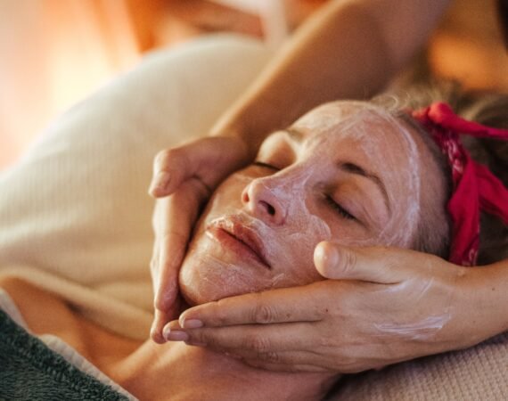 Female with mask on face in spa center