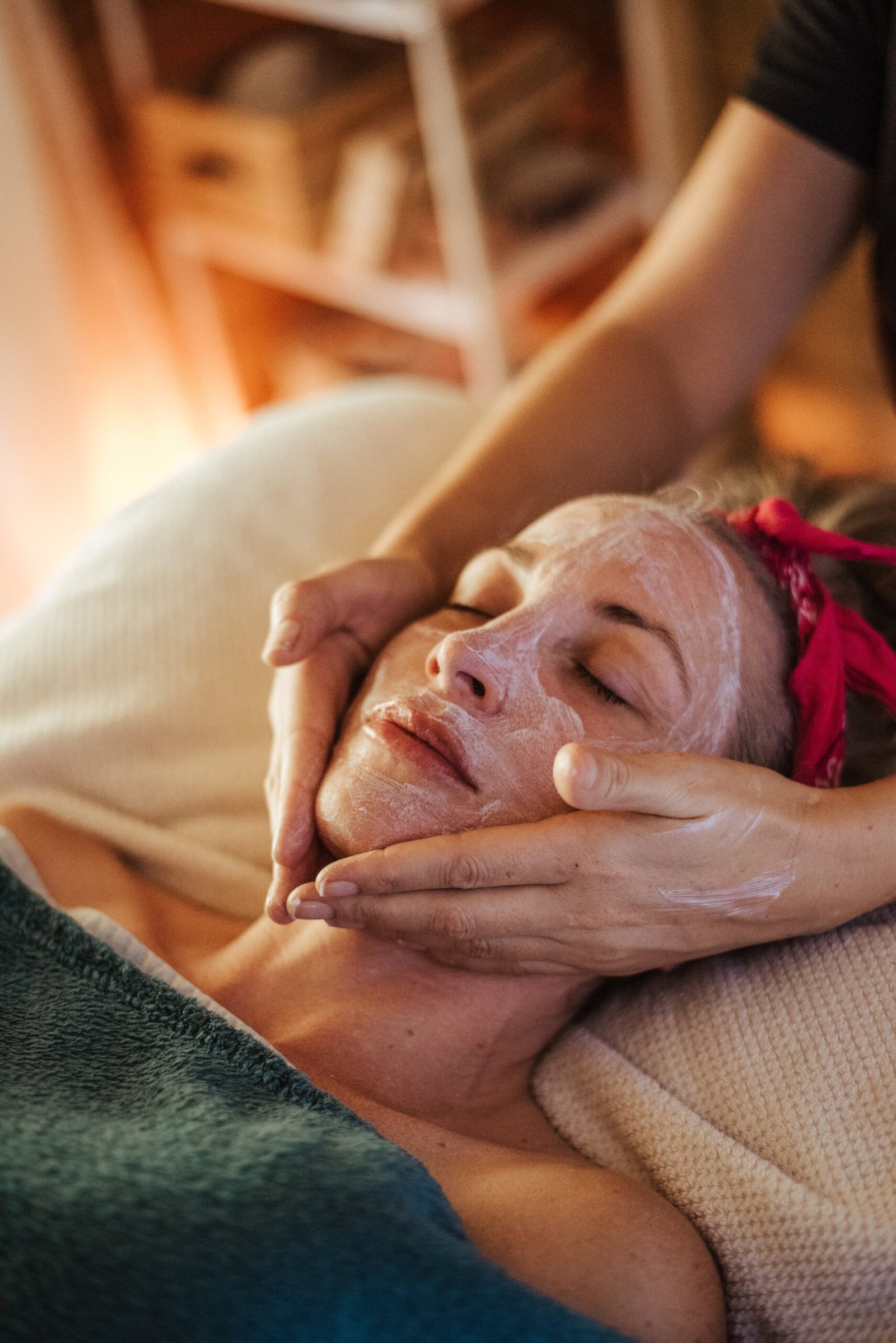 Female with mask on face in spa center